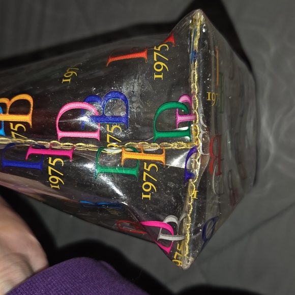 Dooney & Bourke "It On the Go" clear acrylic/PVC cosmetic case with a multicolor - Picture 4 of 5